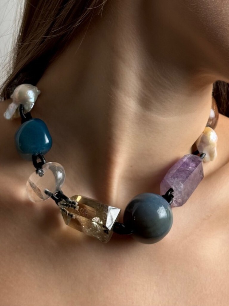 Statement necklace with mixed materials leather chain