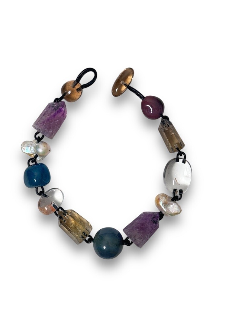 Statement necklace with mixed materials leather chain